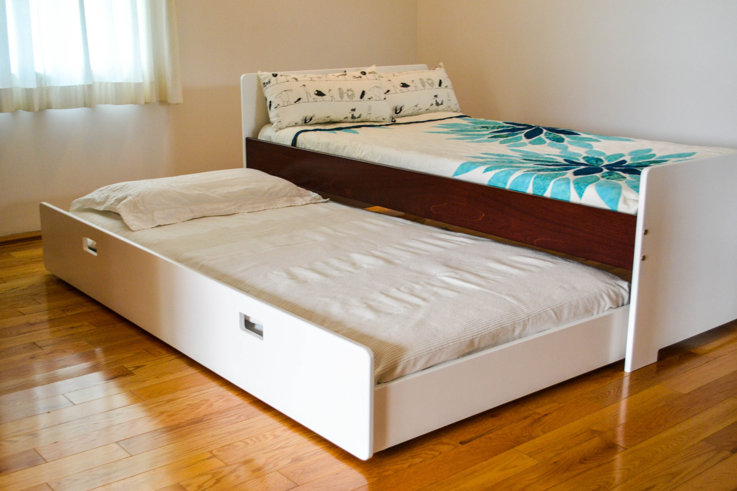 Minimalist bed with trundle